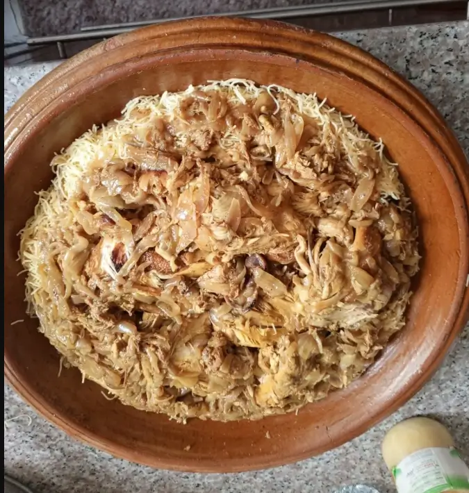 Seffa Moroccan chicken with vermicelli served in a traditional clay dish