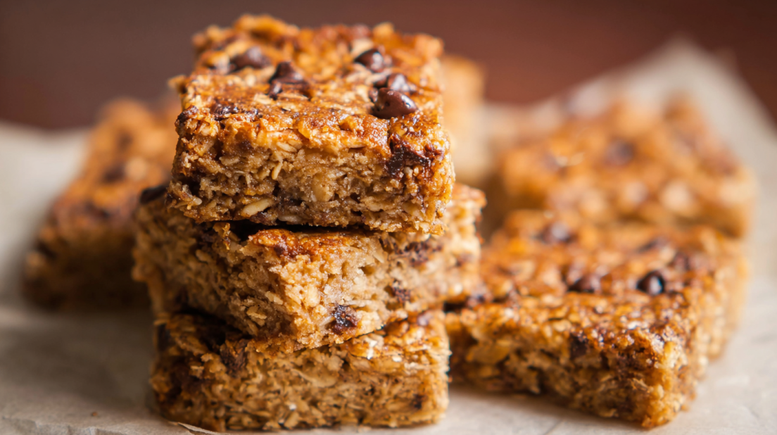 Banana Oatmeal Bars soft baked bars made with ripe bananas and oats, healthy homemade snack squares on white plate