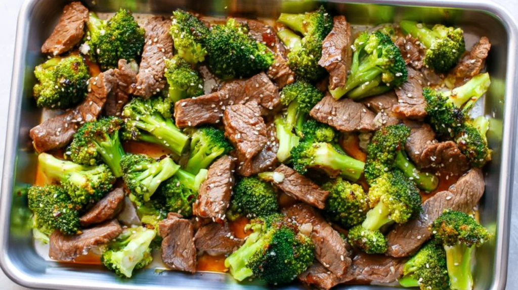 Sheet pan beef and broccoli with tender sliced beef, roasted broccoli, and savory sauce