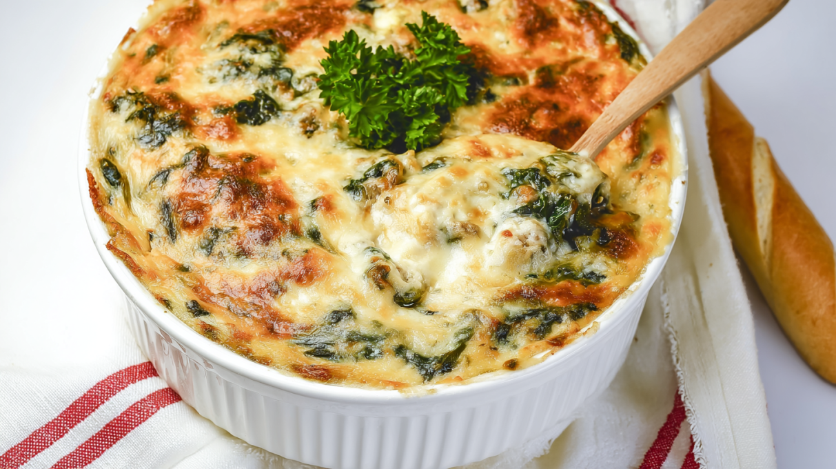 Zuppa Toscana casserole with sausage, potatoes, kale, and creamy sauce baked until golden